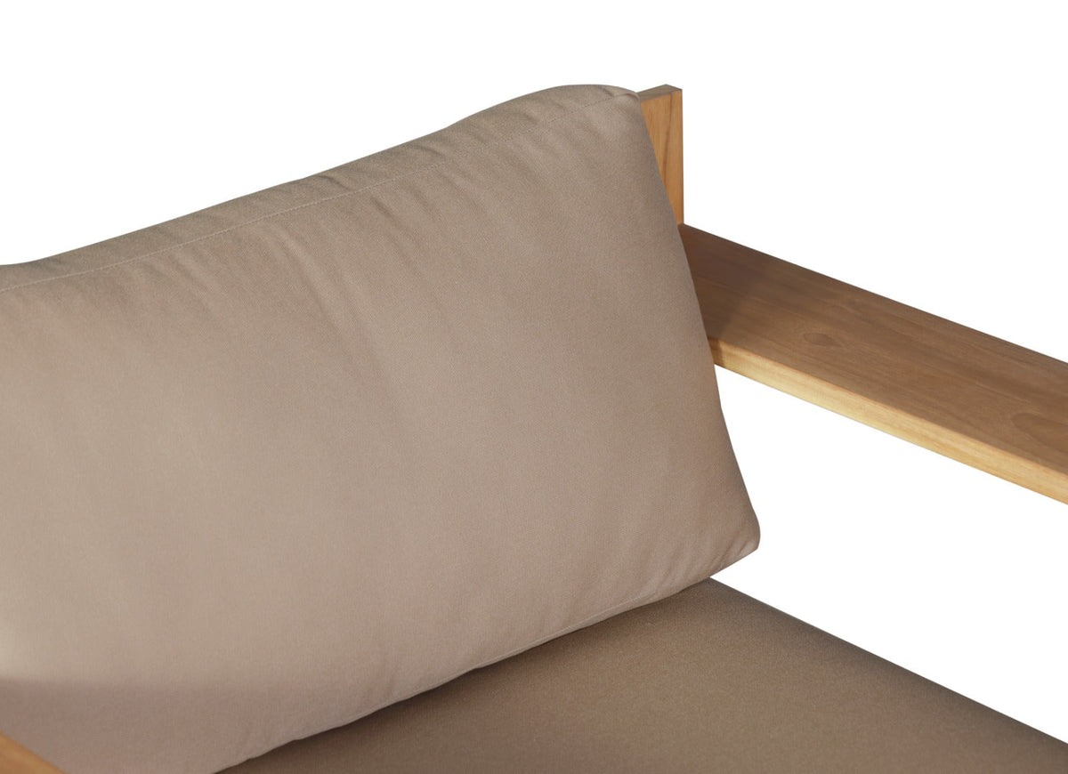 Beige outdoor armchair back cushion with light teak armrest and seat cushion