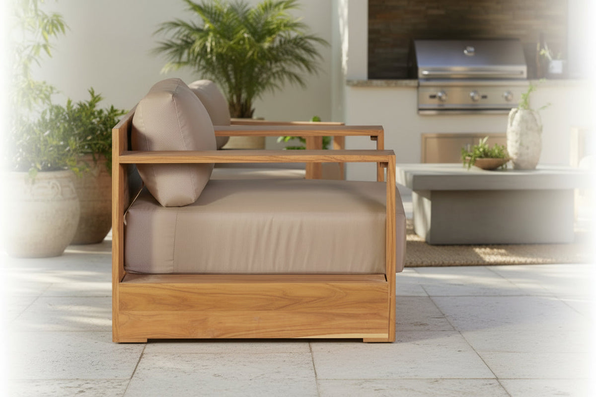 Outdoor teak revolving chair with beige cushion set and armrest support