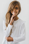 White ruffle cardigan with button-front and ruffled sleeves