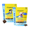Two yellow dog treat pouches with small brown treat pieces, blue and orange flavor accents.