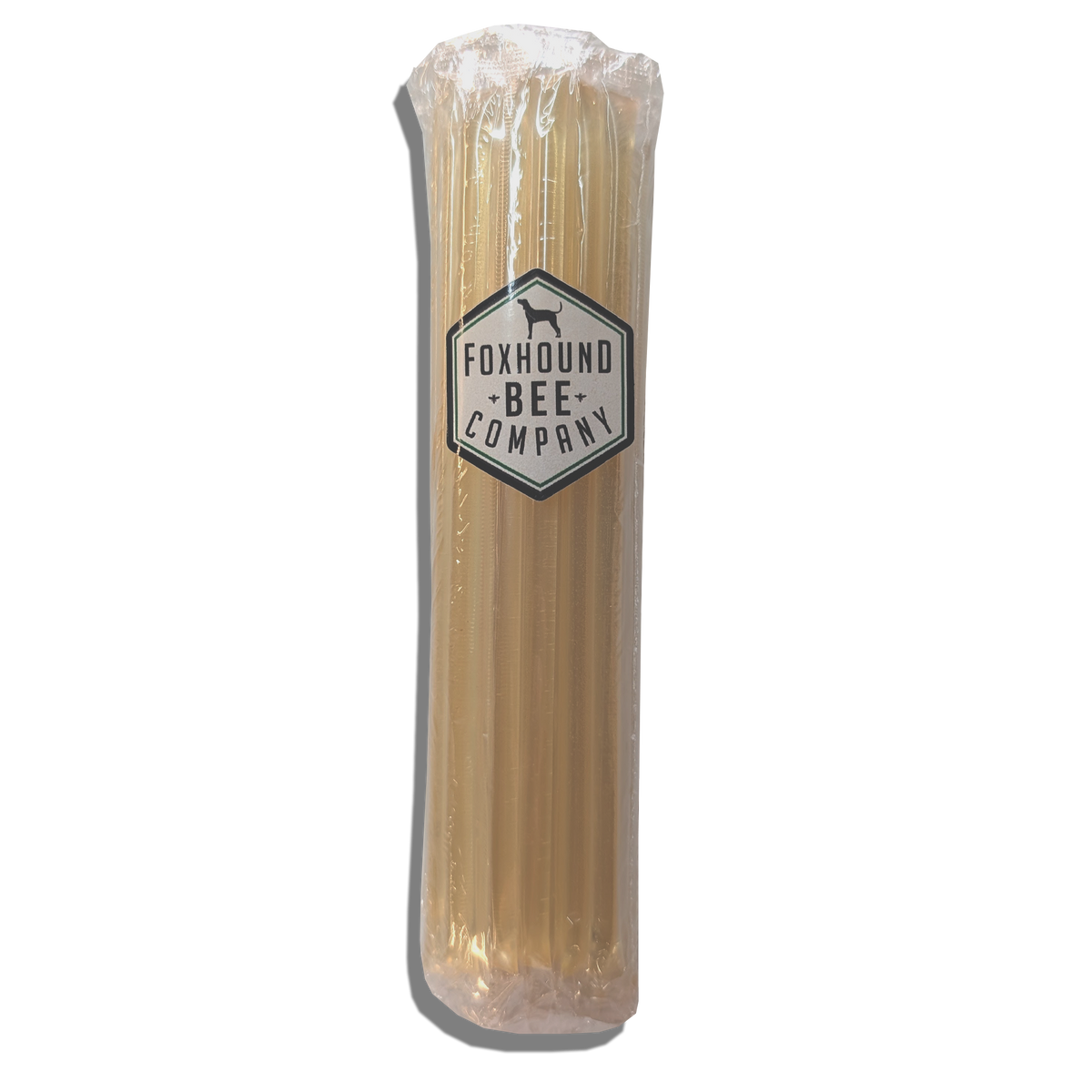 Single honey stick in light amber color, sealed in clear plastic