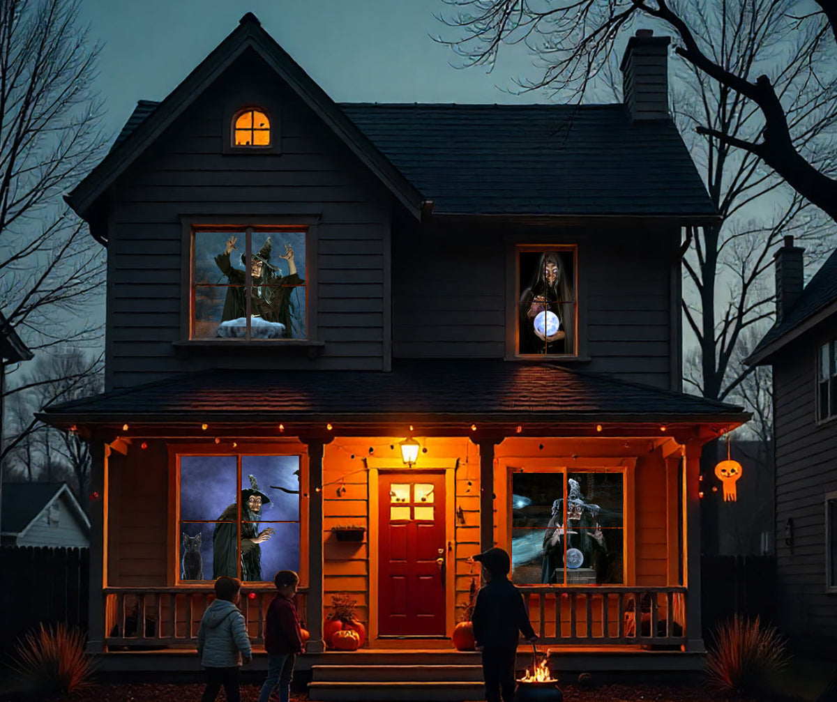 USB projector kit projecting witch artwork onto outdoor window