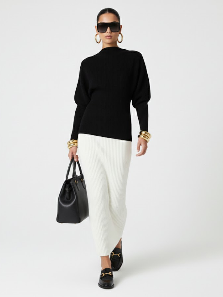 Black crew-neck knit sweater with long sleeves and ribbed hem and cuffs