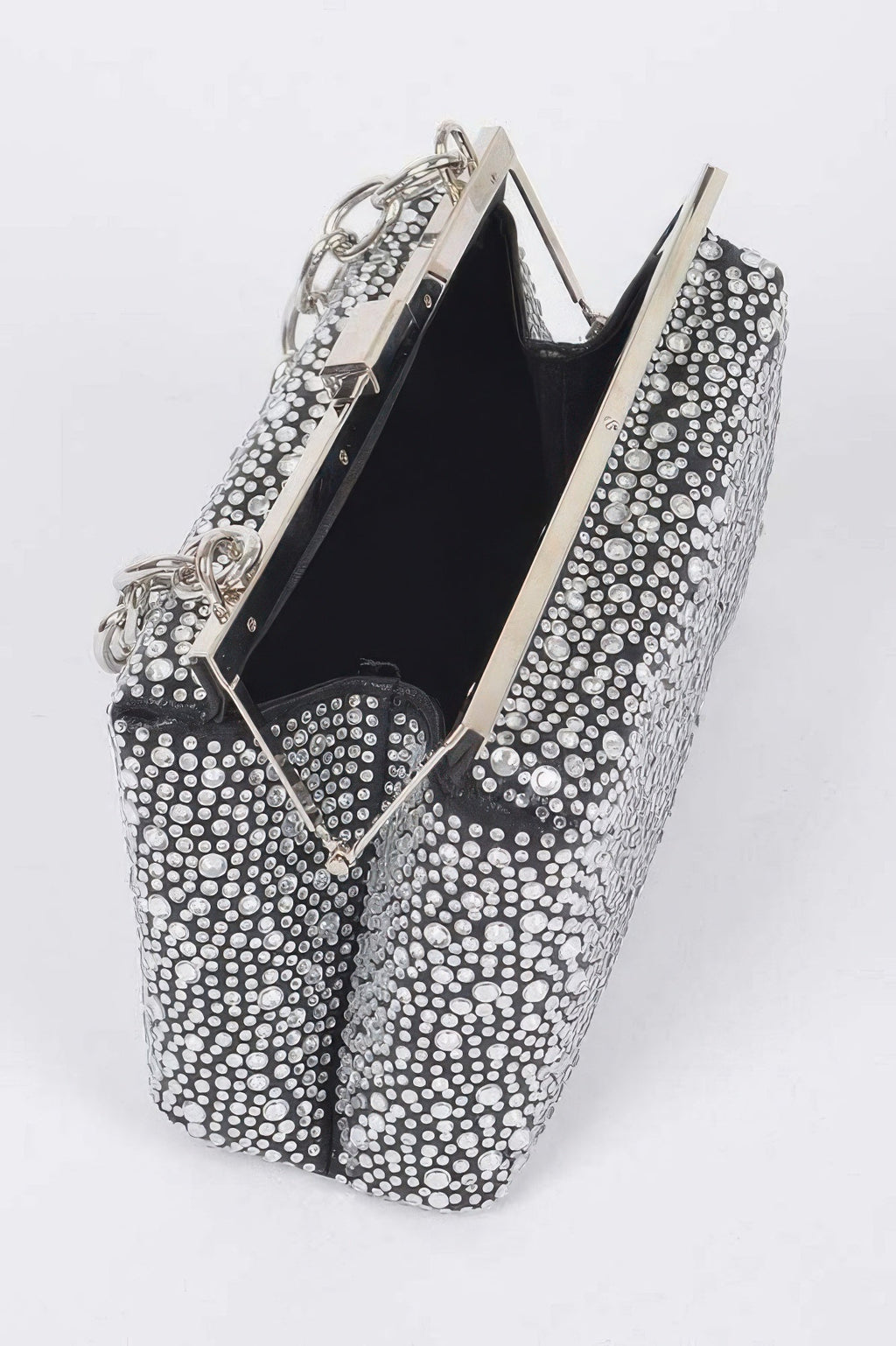Open rhinestone hotfix clutch showing black interior, metal frame and chain handles