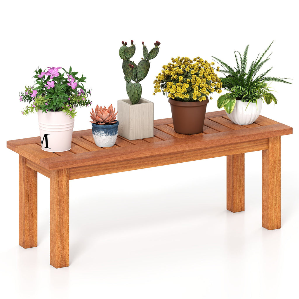 Wooden outdoor plant stand with slatted top and four supporting legs