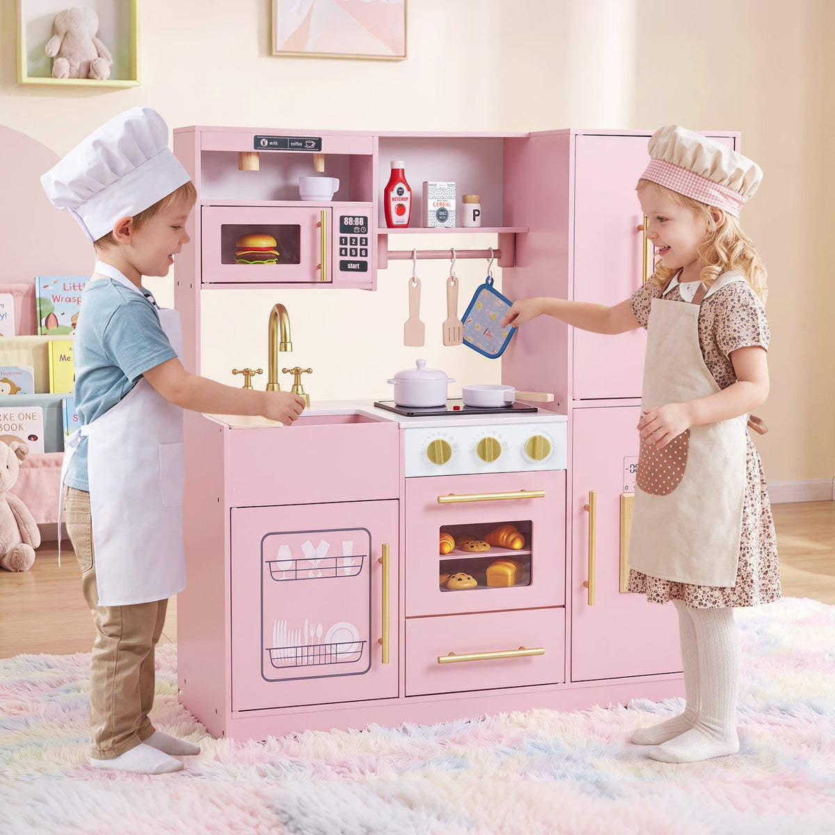 Pink wooden kids play kitchen with stove, oven, doors, and pretend cookware