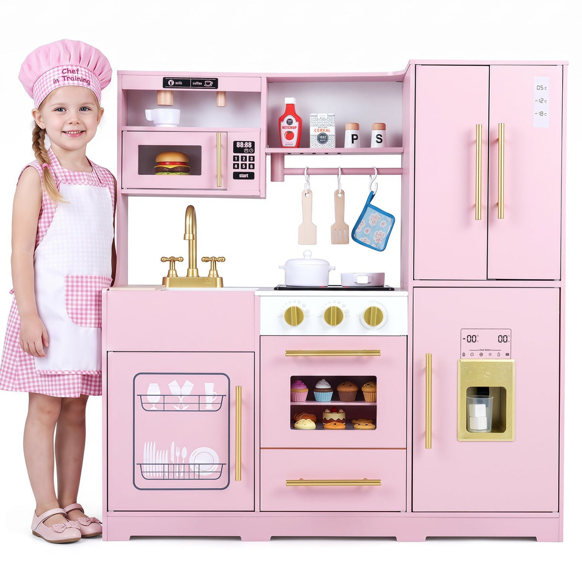 Pink wooden play kitchen with child cook apron, countertop, stove, and oven door