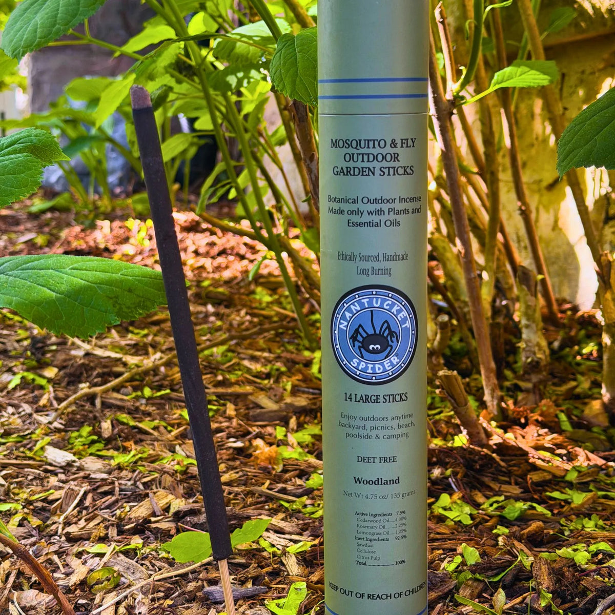 Woodland outdoor garden incense sticks tube, green cylinder with two incense sticks