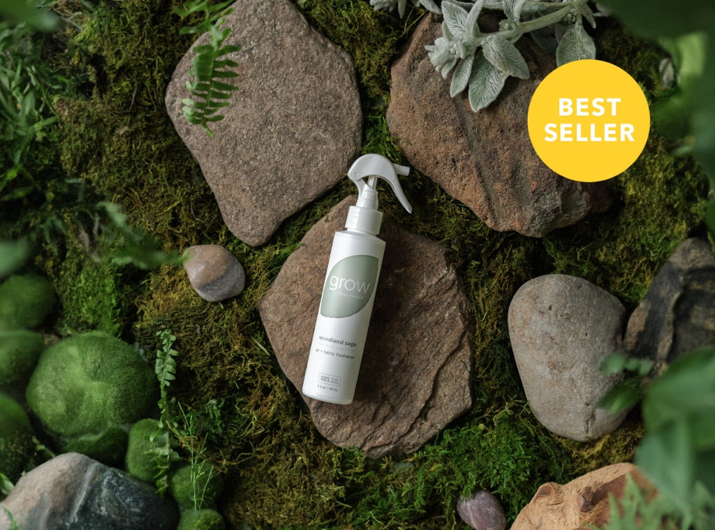 Woodland sage fabric spray bottle on rocks and moss with leafy sprig