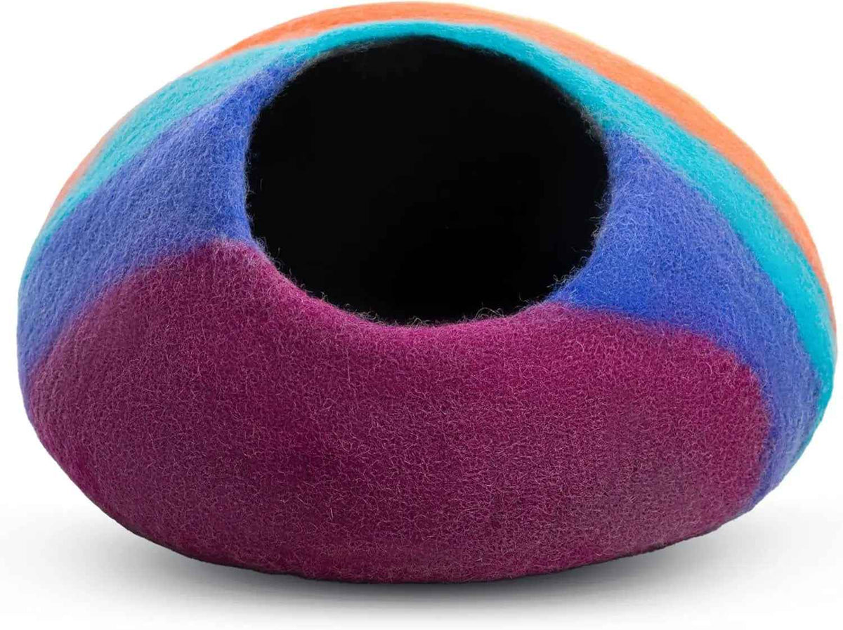 Rainbow wool cat cave bed with a rounded entrance and purple front
