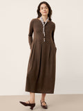 Brown wool midi dress with sculpted pleats, button front, and curved arc-panel seams.
