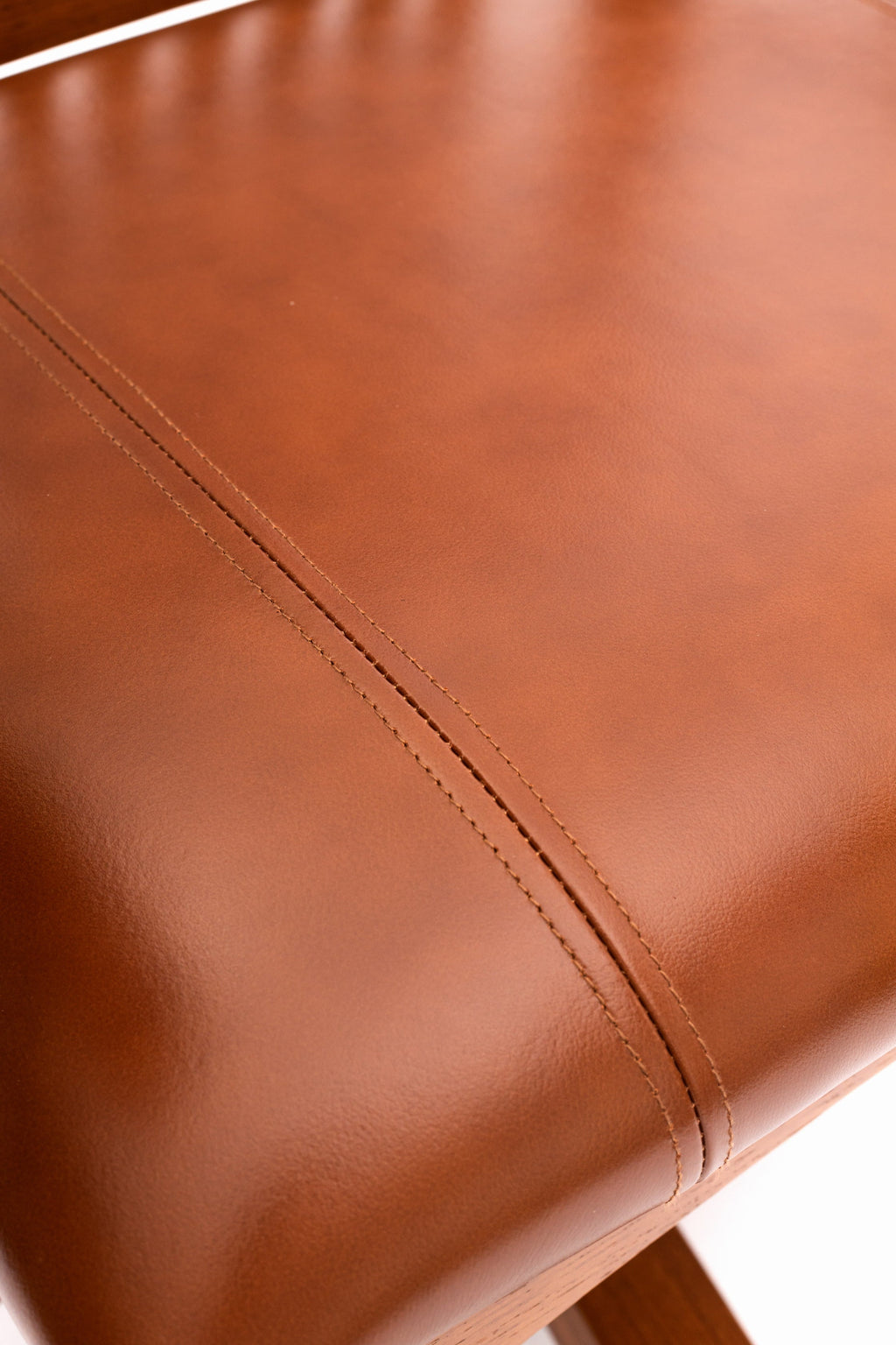 Mission oak office chair brown leather seat with stitched seam close-up