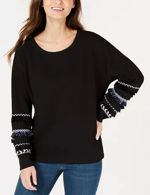 Black crew-neck sweater with striped banded cuffs and contrast fringe trim