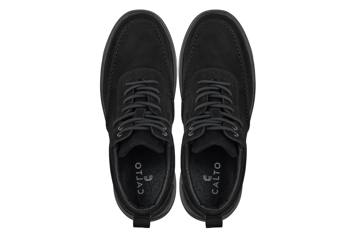 Pair of black lace-up boots with CALTO logo insoles, moc-toe and rubber outsole