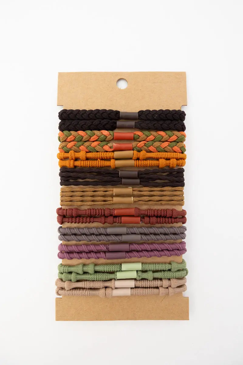Set of braided hair tie bracelets on hanging card, assorted braided bands