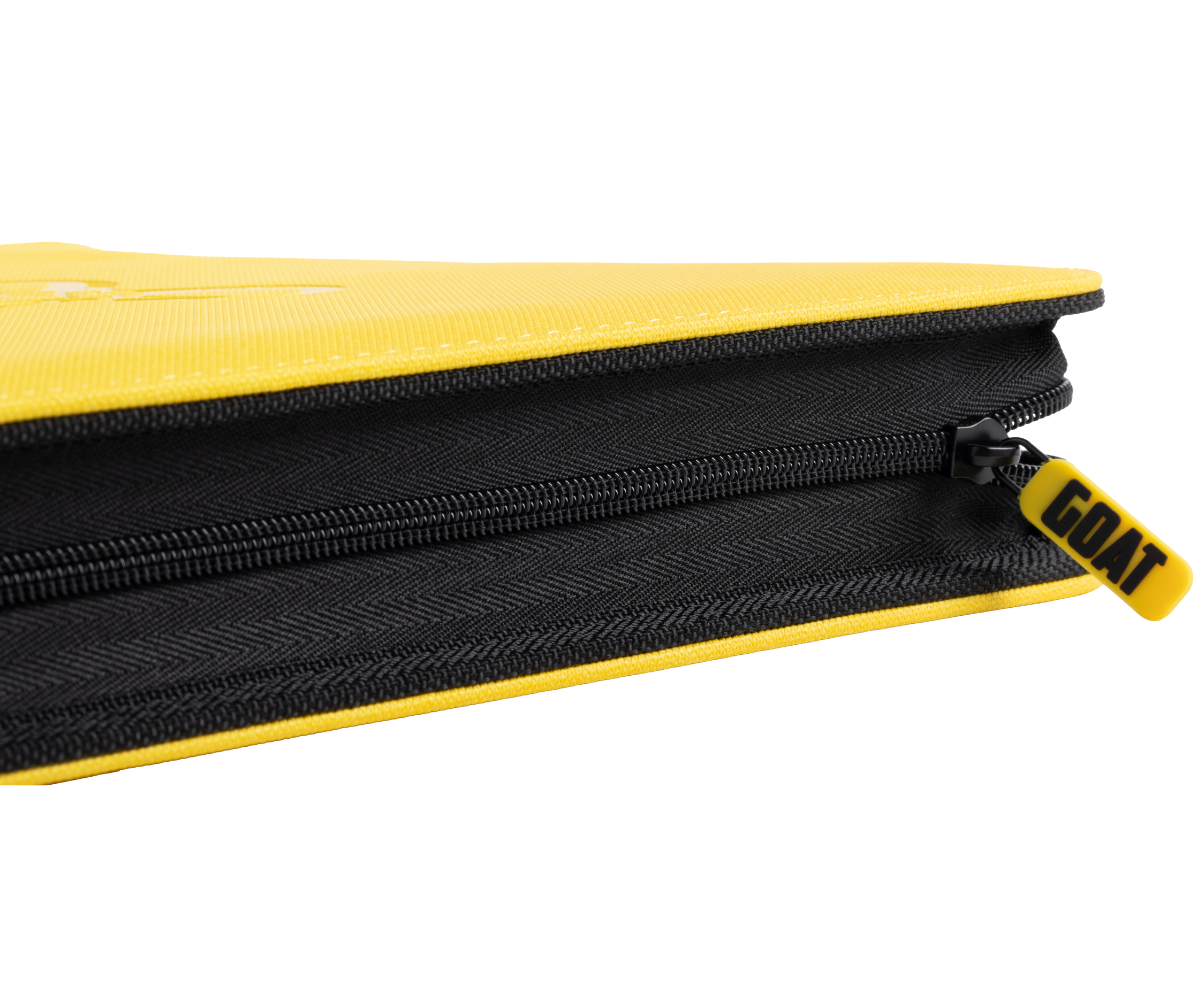 Close-up of black zipper track on yellow card binder with yellow zipper tab