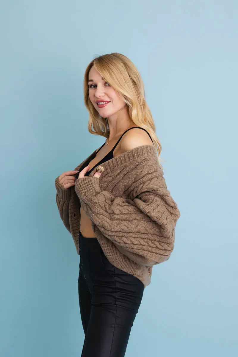 Mocha cropped cable-knit button-up cardigan, side view with button front and sleeves