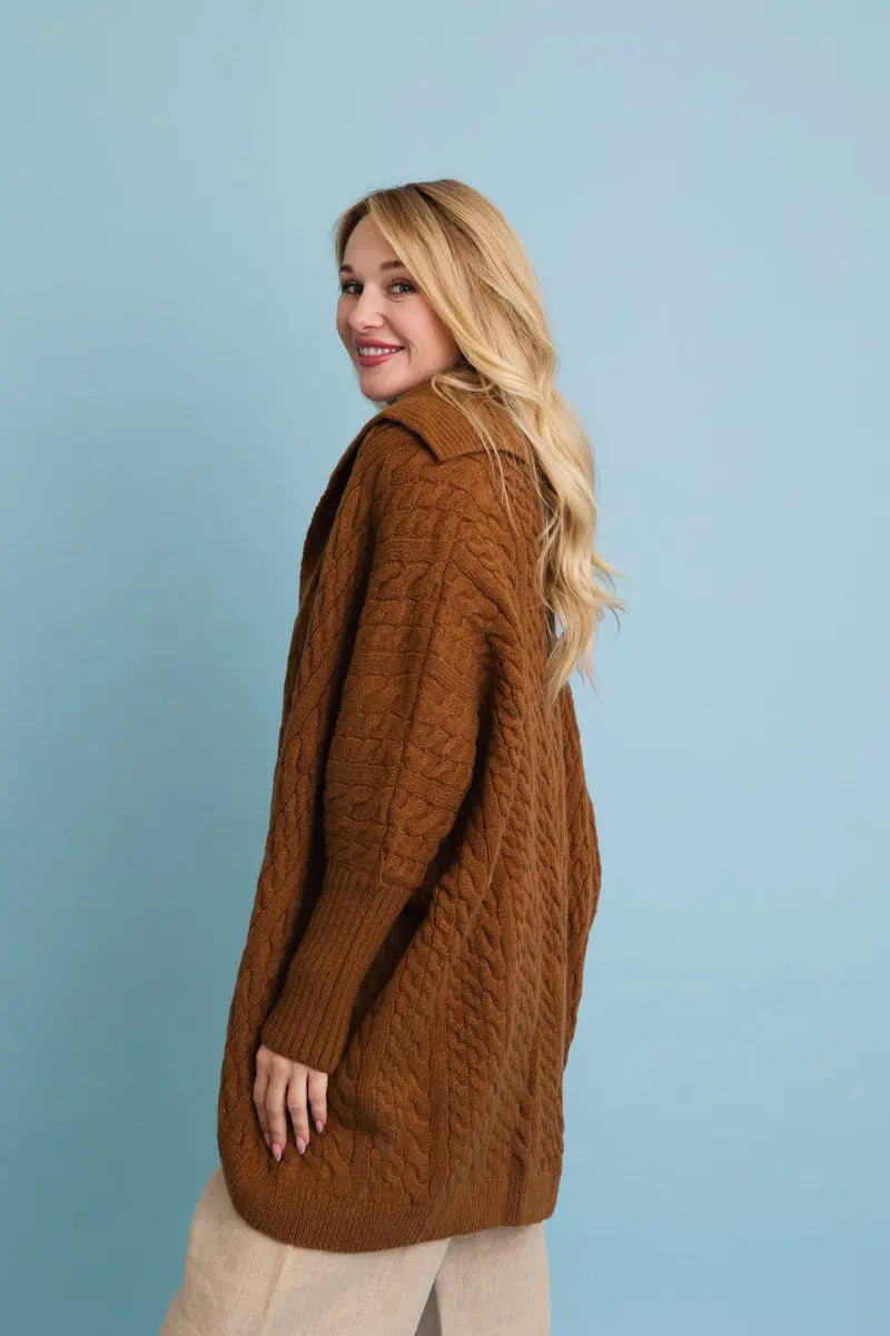 Chunky cable-knit poncho cardigan in brown, textured knit side view