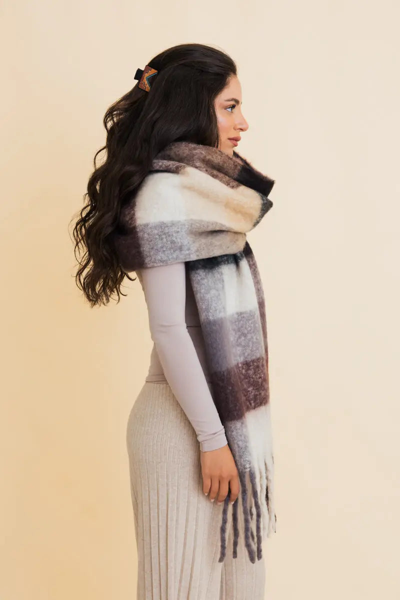 Oversized plaid scarf in cream, taupe, and gray with long fringe ends