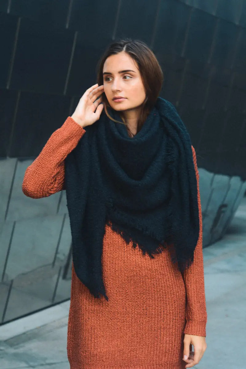 Deep blue plush mohair square scarf with draped cowl and fringed border.