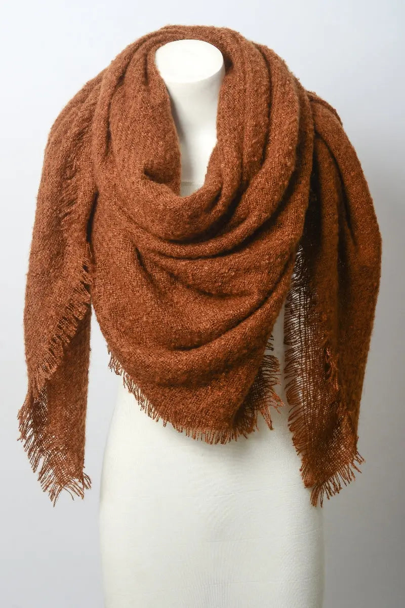 Camel-brown plush mohair square scarf with soft drape and long fringe.