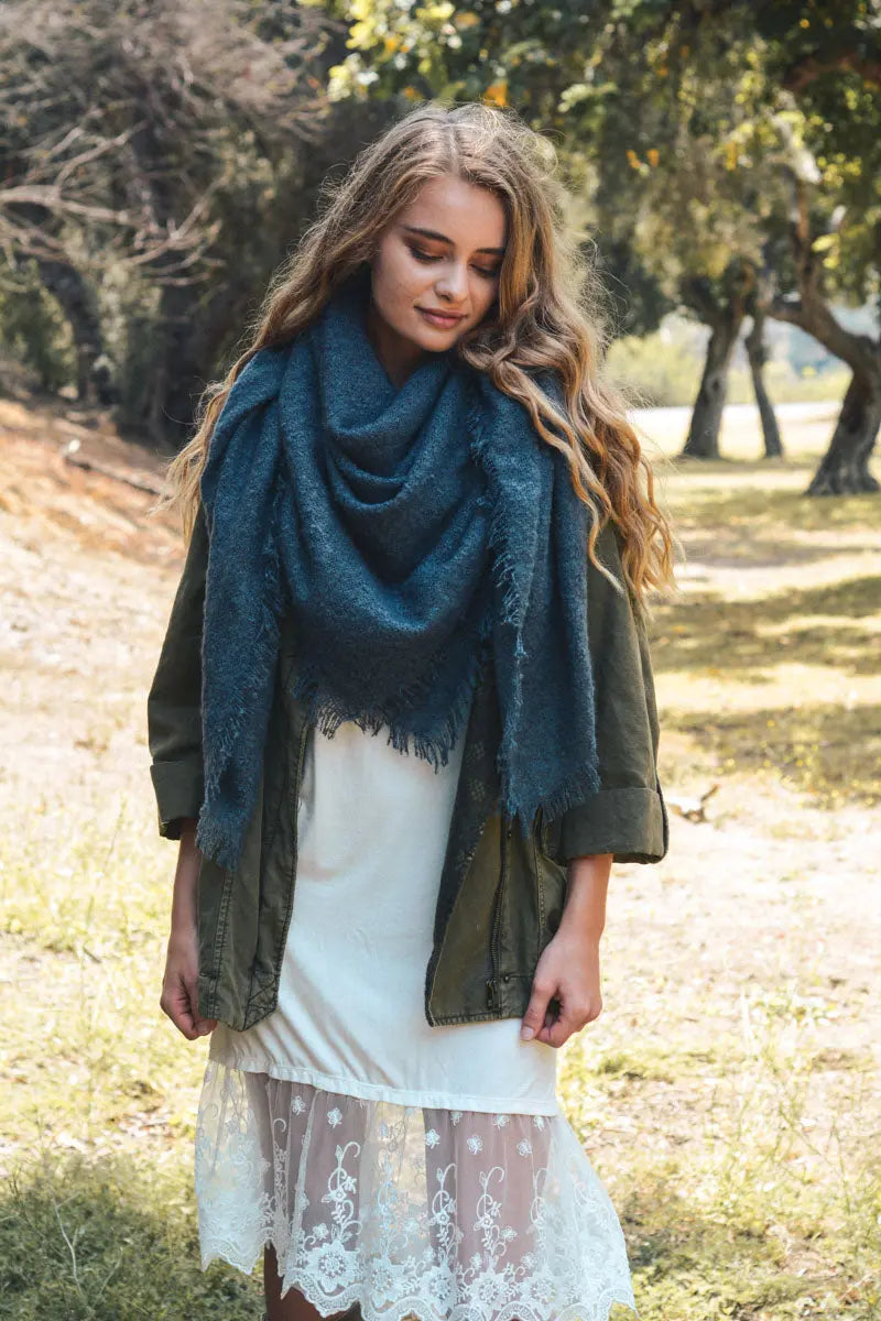 Blue mohair square scarf wrap with soft drape and fringed edges