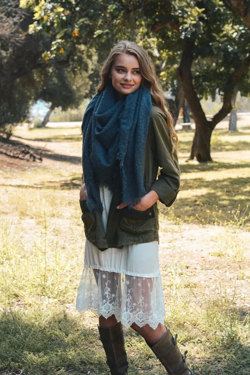 Blue mohair square scarf wrap with soft drape and fringed trim