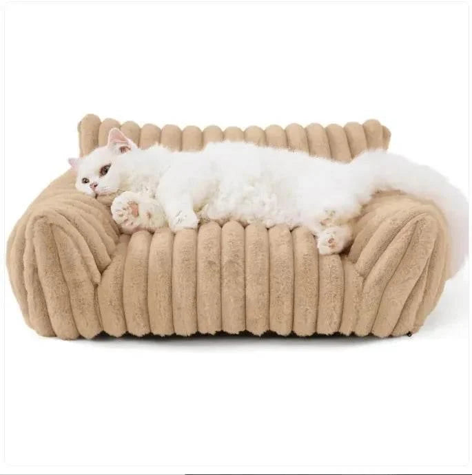 Large fluffy orthopedic dog bed with cream ribbed bolsters and white plush interior