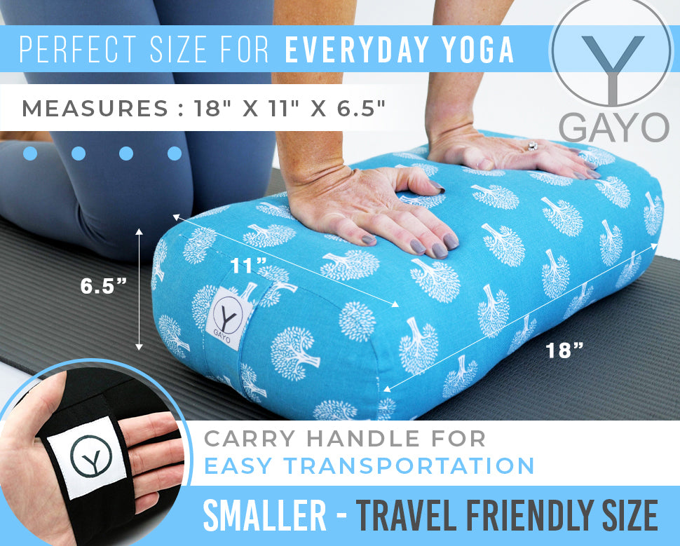 Compact teal elephant-print yoga bolster with side carry handle patch