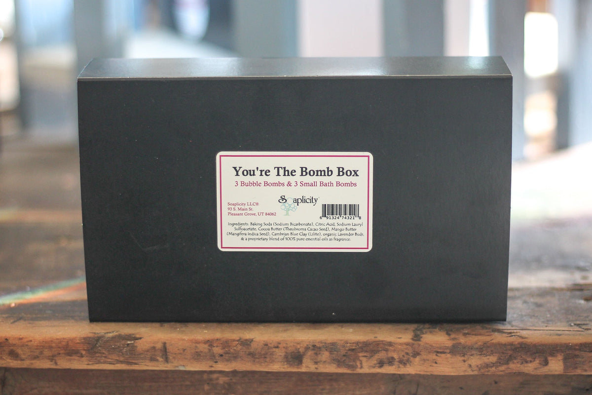 Black bath bomb gift box with front product label