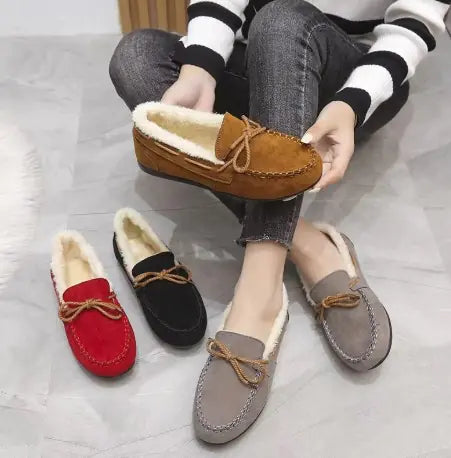 Women's plush slip-on moccasin flats in grey, black, and red with fuzzy lining