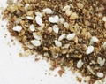 Za'atar seasoning blend, coarse mix of herbs and white seeds in close-up