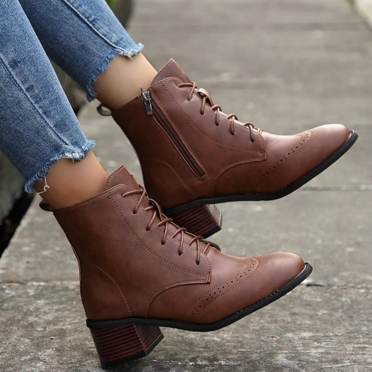 Brown lace-up ankle boots with side zipper, lace-up front and block heel