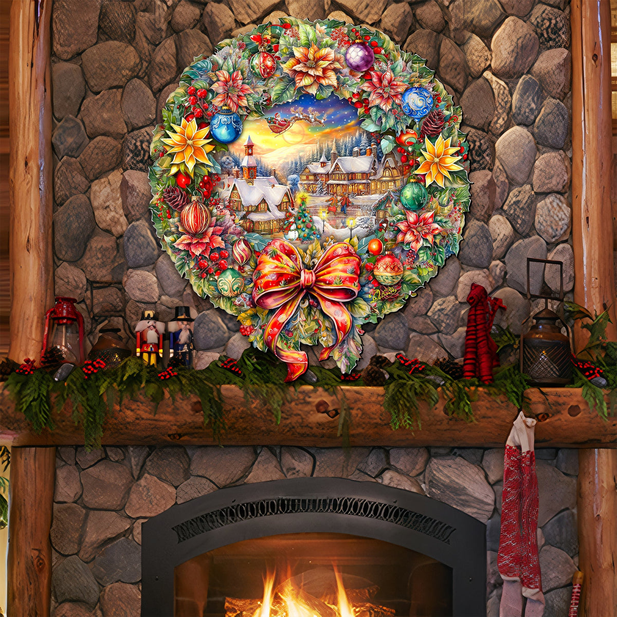 Christmas wreath featuring a colorful village tableau with ornaments and ribbon bow