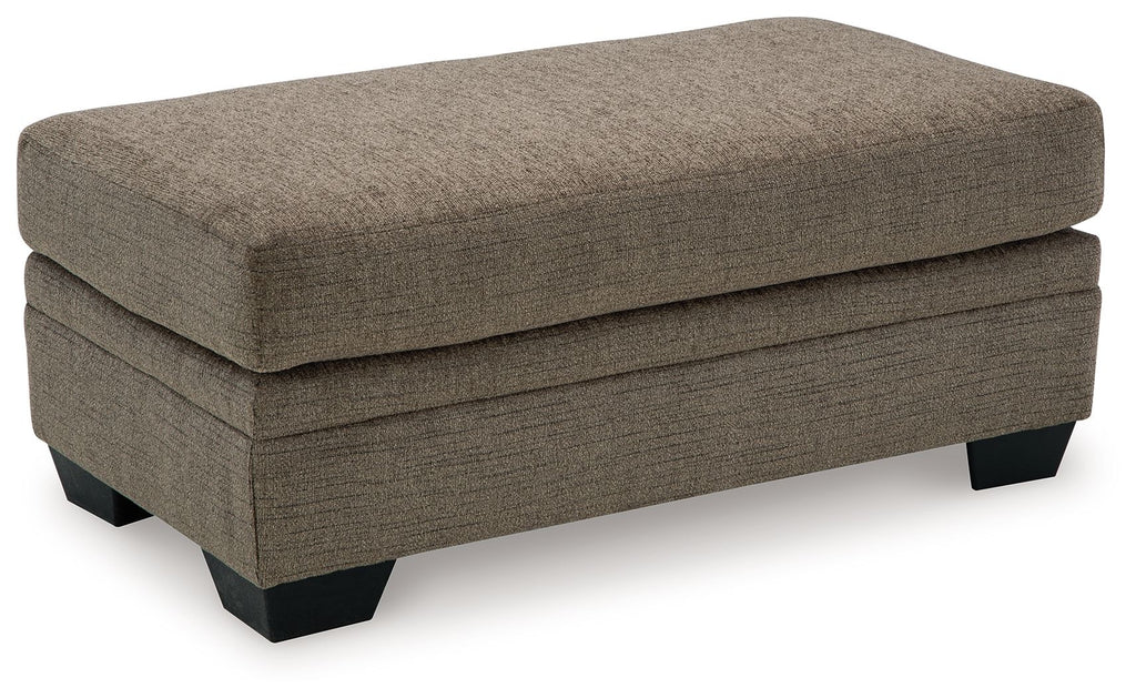 Upholstered ottoman with tufted top look, dark feet and textured gray-brown fabric