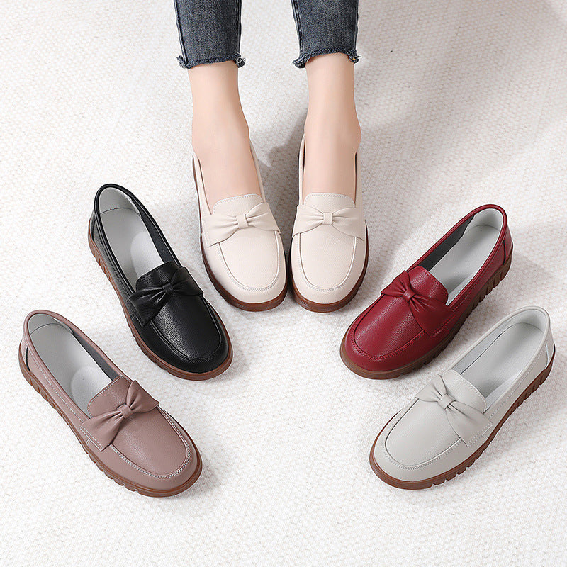 Set of women’s flat loafers in beige, black, gray, red, and brown with rubber soles