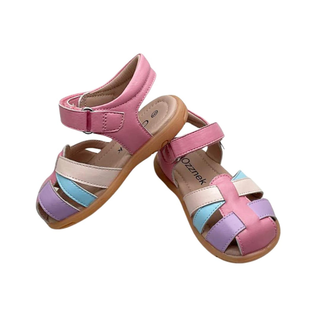 Pair of kids closed-toe sandals in pink with beige, lilac, and blue strap panels