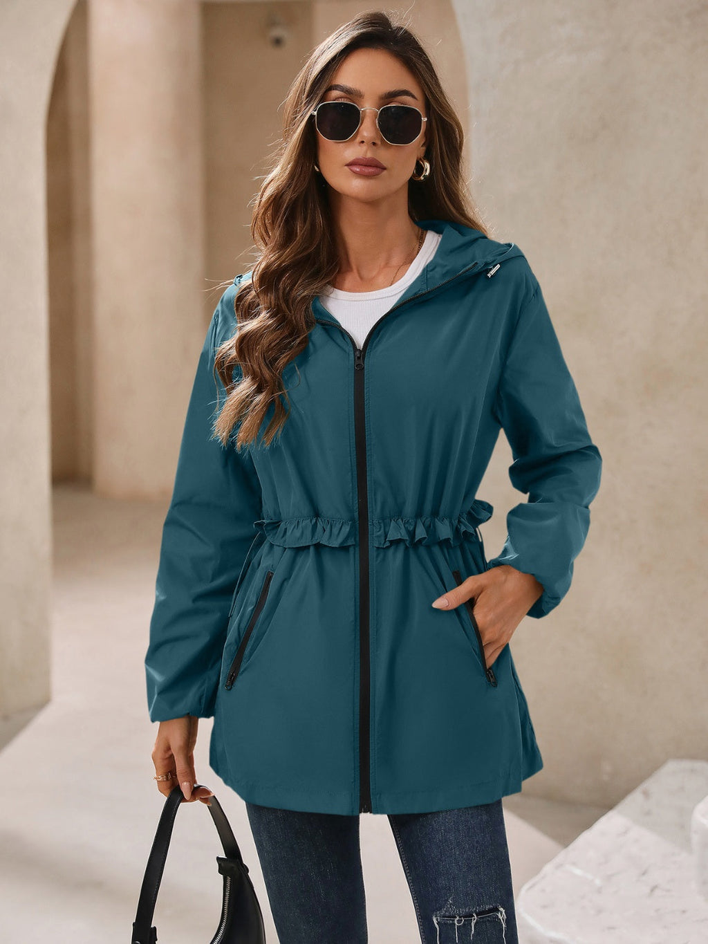 Teal hooded windbreaker jacket with elastic cuffs and gathered hem, zip front