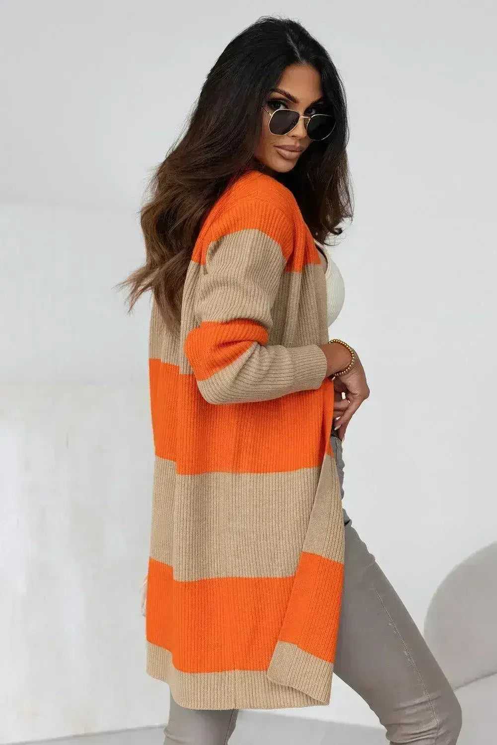 Orange and beige colorblock ribbed knit cardigan, long sleeves, relaxed open front