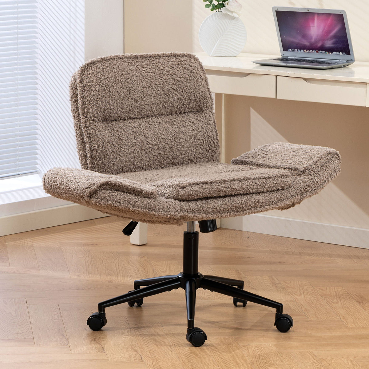 Dark brown fabric swivel desk chair with padded seat, curved back, and rolling casters.