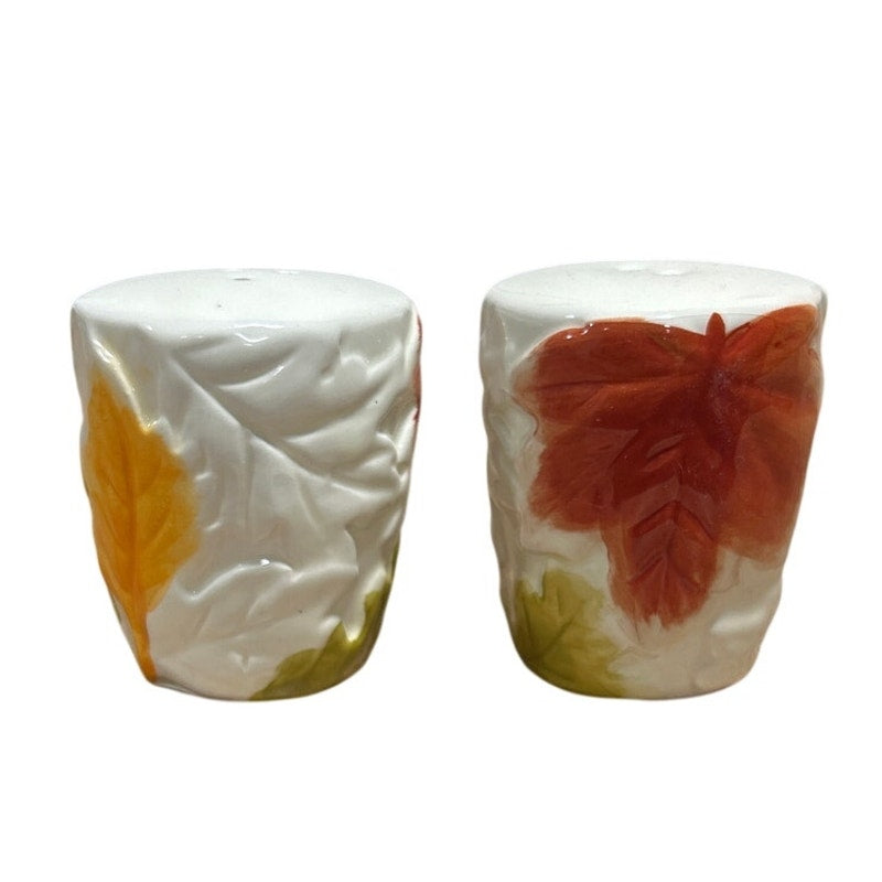 Ceramic salt and pepper shaker set, white with orange red and yellow leaf design