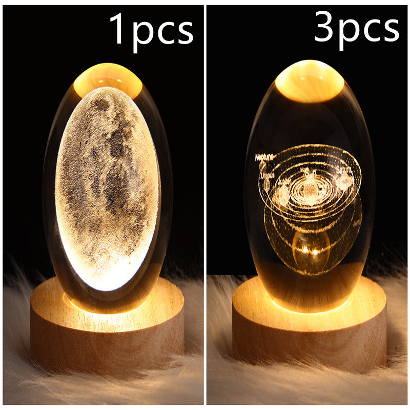 Set of crystal ball LED night lights: moon face and Saturn-like ring design