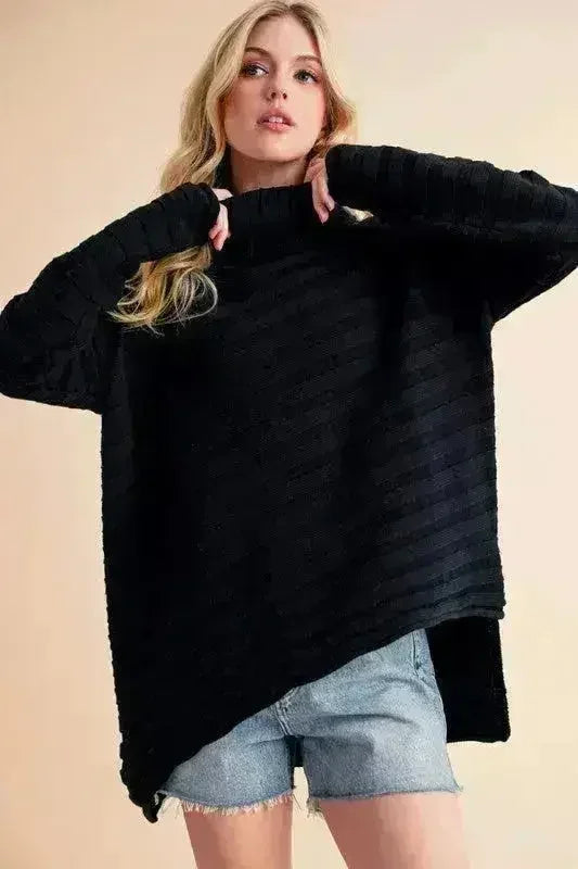 Black turtleneck pullover with side-slit stepped hem and long sleeves