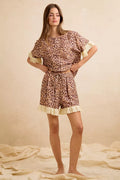 Leopard print ruffled top and matching shorts set with eyelet lace trim