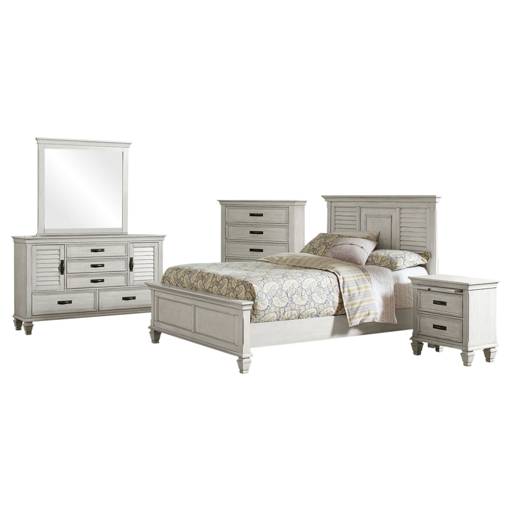 Distressed white king bed with dresser, nightstands, and decorative mirror