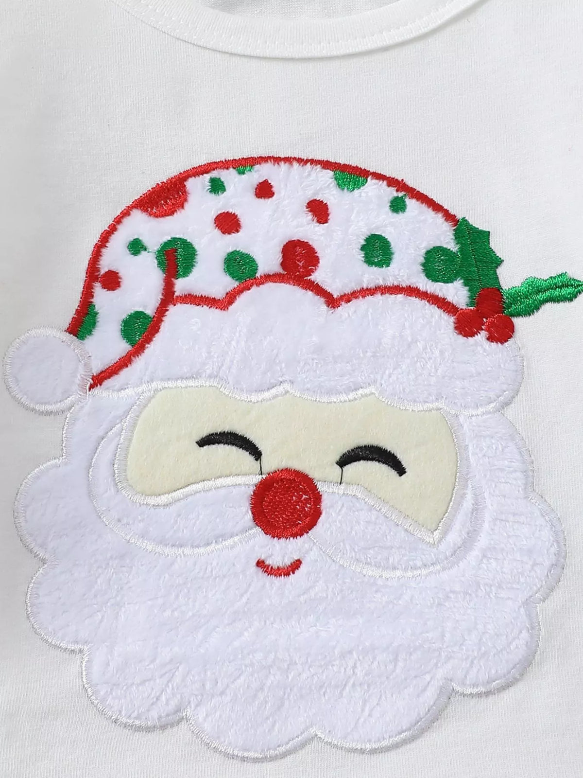 White Christmas top with embroidered Santa face applique