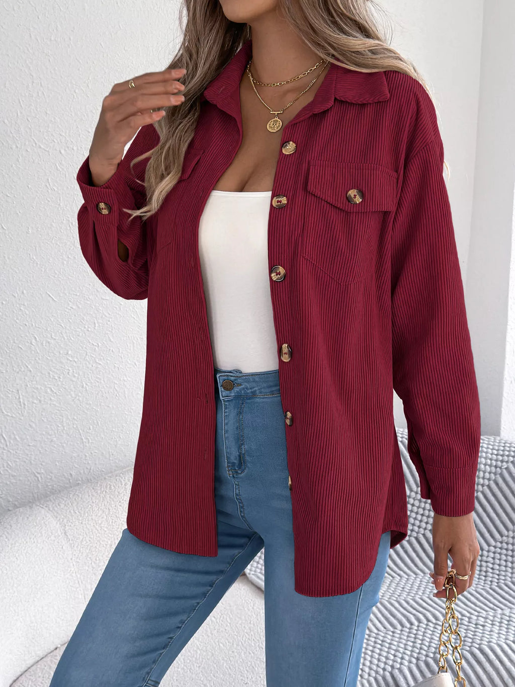 Wine red corduroy button-up shacket with chest flap pocket and gold button details