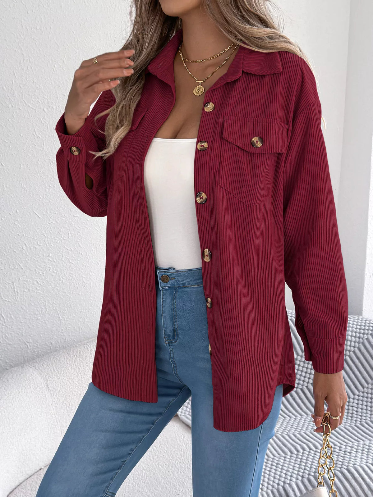Wine red corduroy button-up shacket with chest flap pocket and gold button details