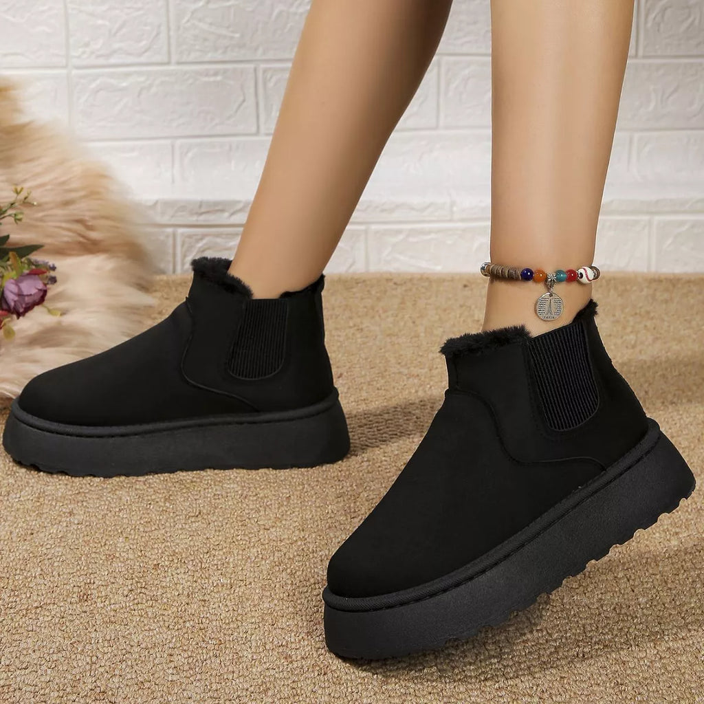 Black suede platform ankle boots with round toe and elastic gore