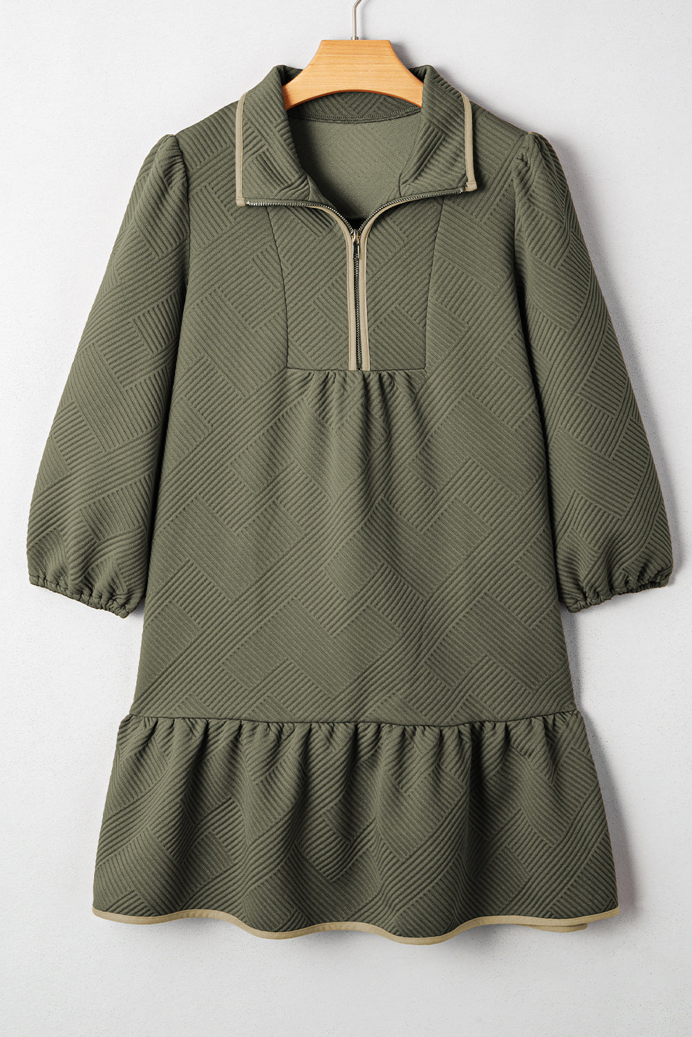 Jungle green textured mini dress on hanger, quarter-zip neckline and ruffle hem
